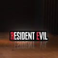 Front view of Resident Evil Umbrella Corp Horror LED lightbox sign glowing on a wooden desk