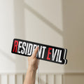 Unlit Resident Evil Umbrella Corp Horror LED lightbox held by hand to show size and details