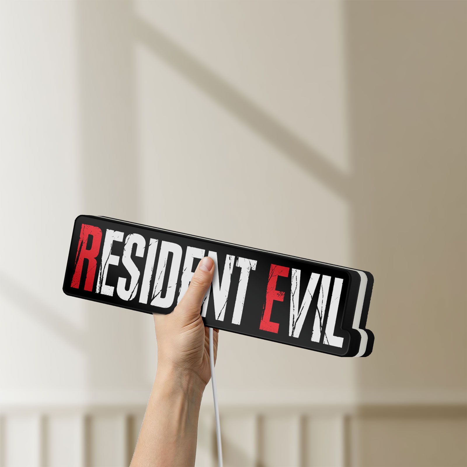Unlit Resident Evil Umbrella Corp Horror LED lightbox held by hand to show size and details