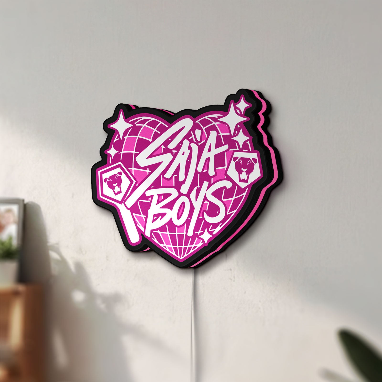 Unlit K-Pop Finger Heart Korean Idol LED lightbox mounted on a wall in daylight