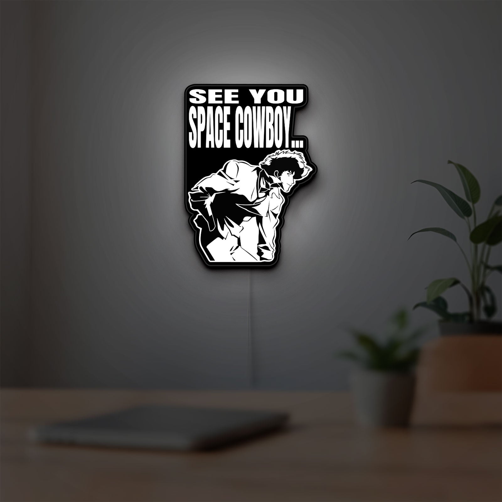 Cowboy Bebop See You Space Cowboy LED lightbox hanging on a room wall with soft white light