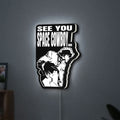 Cowboy Bebop See You Space Cowboy LED lightbox hanging on a wall with white glow