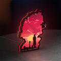 Cowboy Bebop See You Space Cowboy LED lightbox standing on a desk from an angled side view with red glow