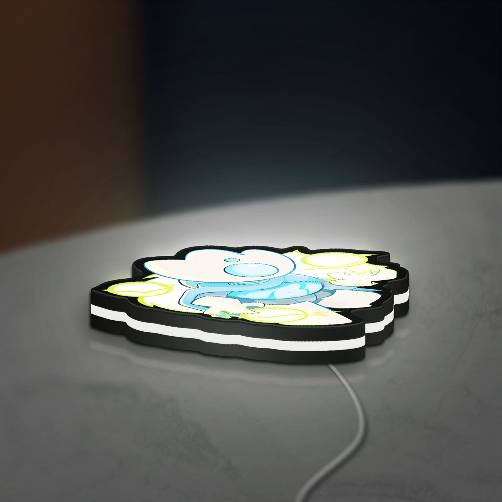 Slay the Spire Roguelike Game LED lightbox lying flat on a desk with white glow