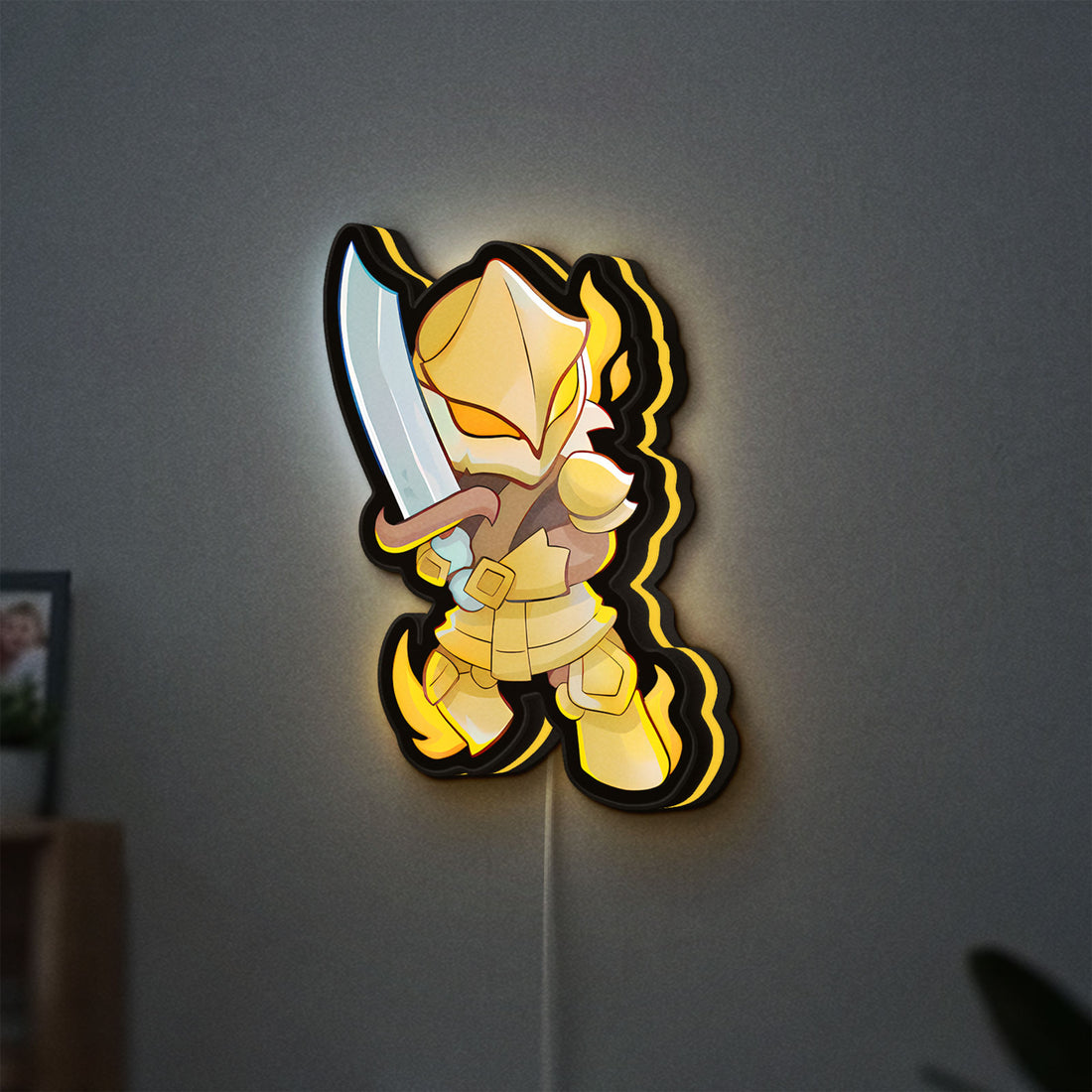 Slay the Spire Roguelike Game LED lightbox hanging on a wall with yellow glow