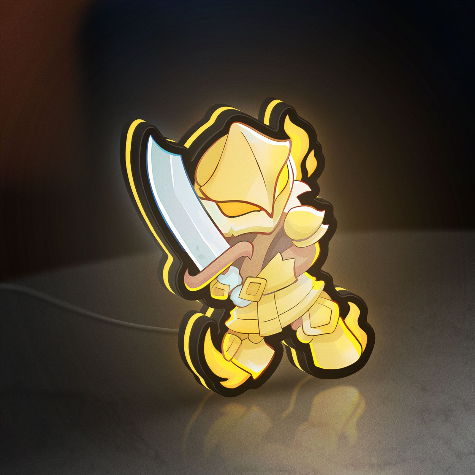 Slay the Spire Roguelike Game LED lightbox standing on a desk from an angled side view with yellow glow