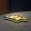 Slay the Spire Roguelike Game LED lightbox lying flat on a desk with yellow glow