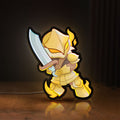 Front view of Slay the Spire Roguelike Game LED lightbox sign glowing on a wooden desk