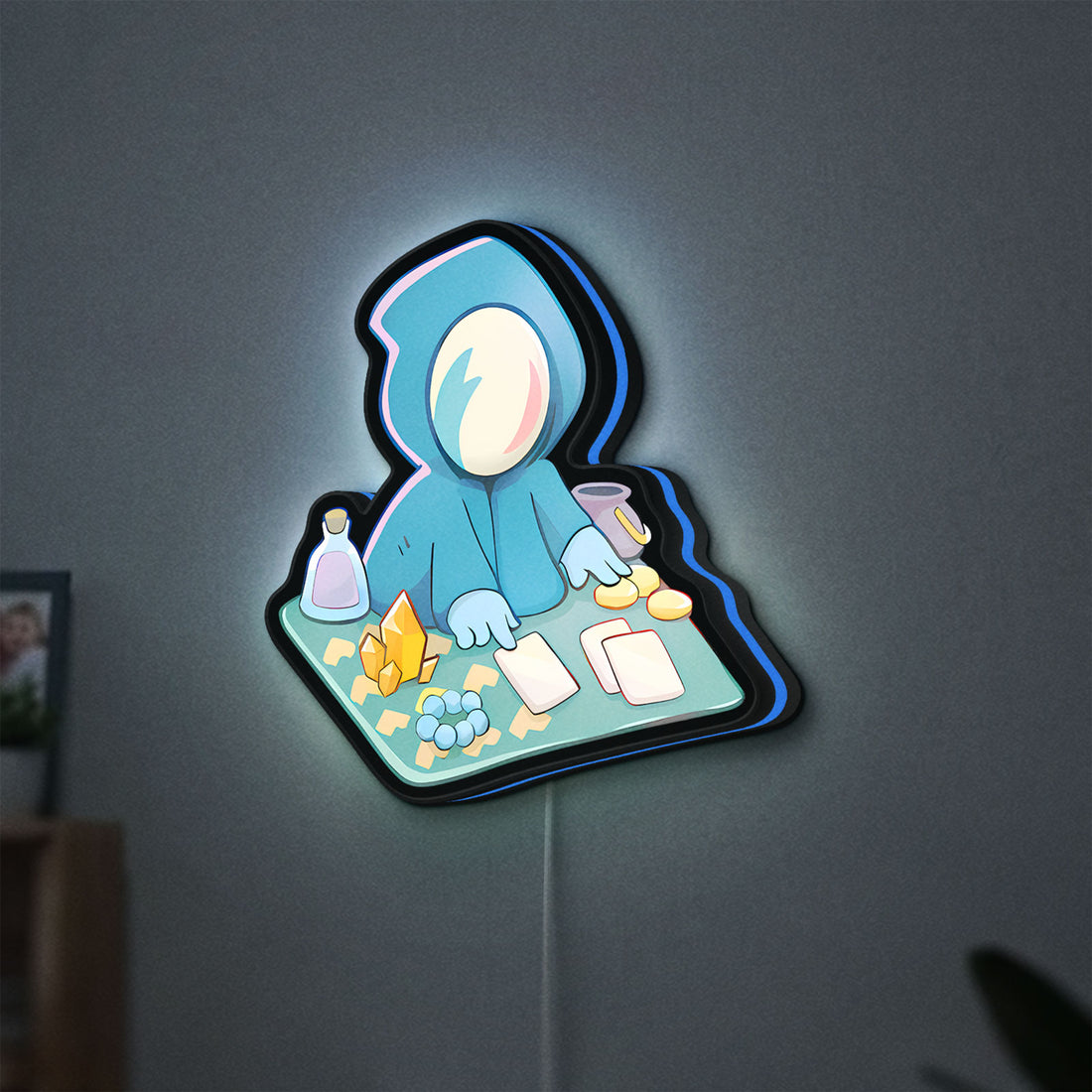 Slay the Spire Roguelike Game LED lightbox hanging on a wall with blue glow