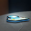 Slay the Spire Roguelike Game LED lightbox lying flat on a desk with blue glow