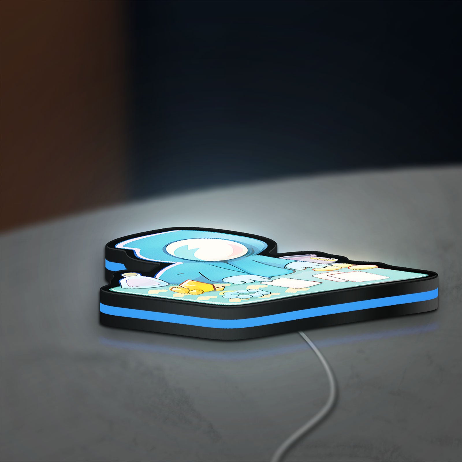 Slay the Spire Roguelike Game LED lightbox lying flat on a desk with blue glow