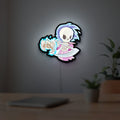 Slay the Spire Roguelike Game LED lightbox hanging on a room wall with soft white light