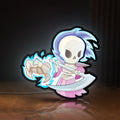 Front view of Slay the Spire Roguelike Game LED lightbox sign glowing on a wooden desk