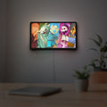 Slay the Spire Roguelike Game LED lightbox hanging on a room wall with soft white light