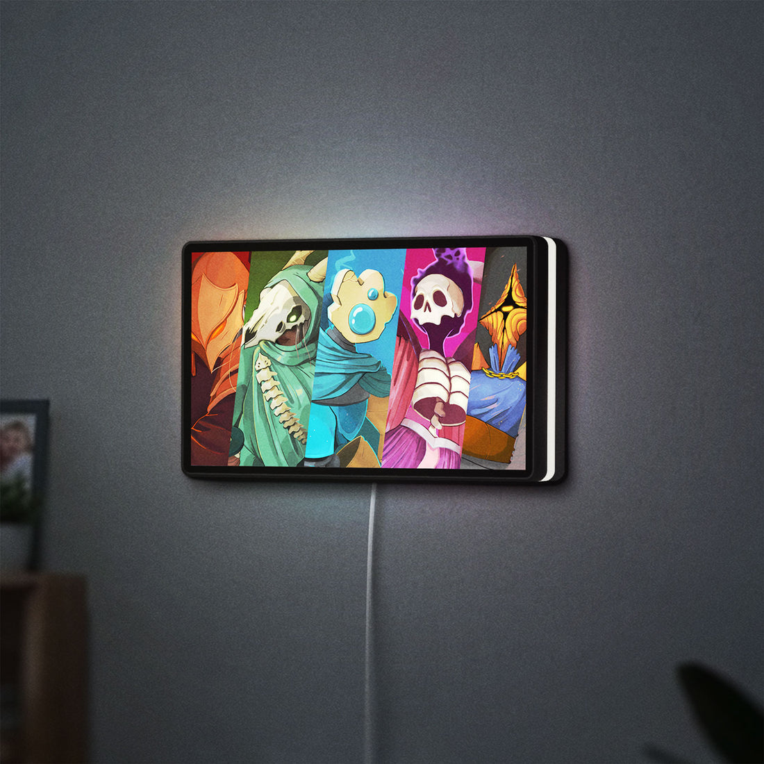 Slay the Spire Roguelike Game LED lightbox hanging on a wall with white glow