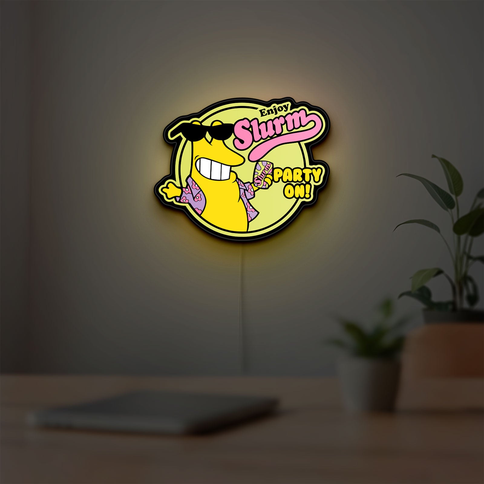 Futurama Slurm Cola Sci-Fi Comedy LED lightbox hanging on a room wall with soft yellow light