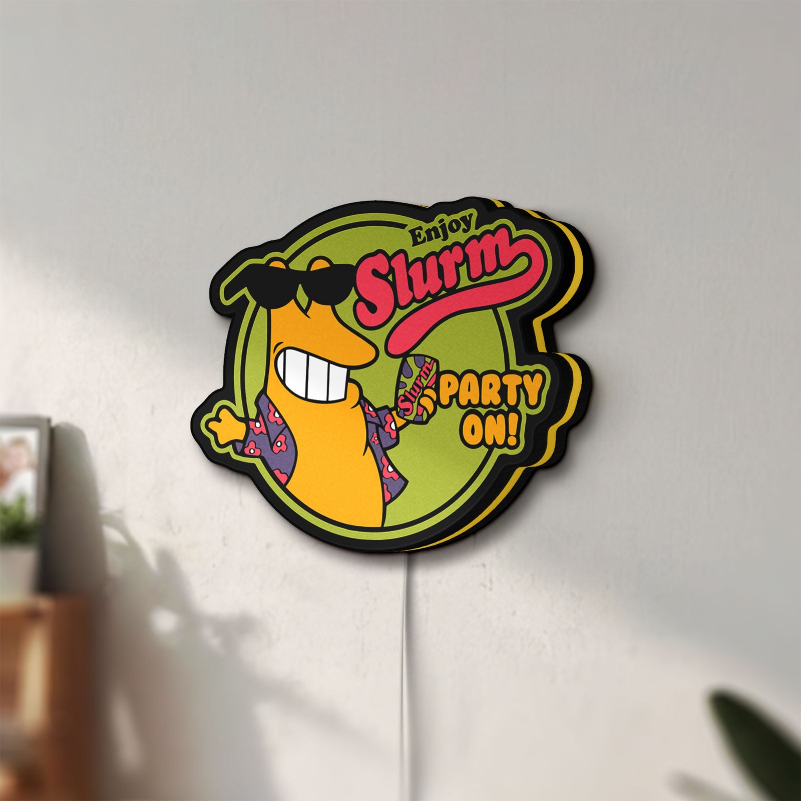 Unlit Futurama Slurm Cola Sci-Fi Comedy LED lightbox mounted on a wall in daylight