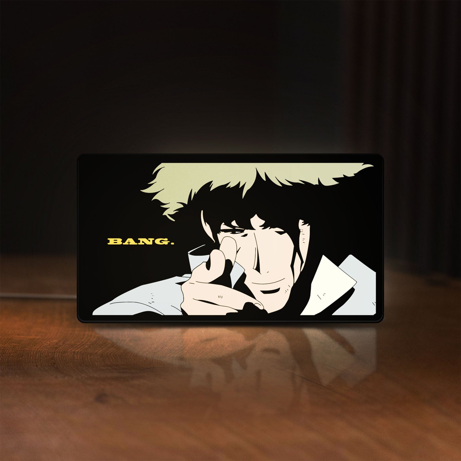 Front view of Cowboy Bebop Spike Spiegel Anime LED lightbox sign glowing on a wooden desk