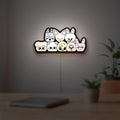 Stray Kids SKZOO K-Pop Mascot LED lightbox hanging on a room wall with soft white light