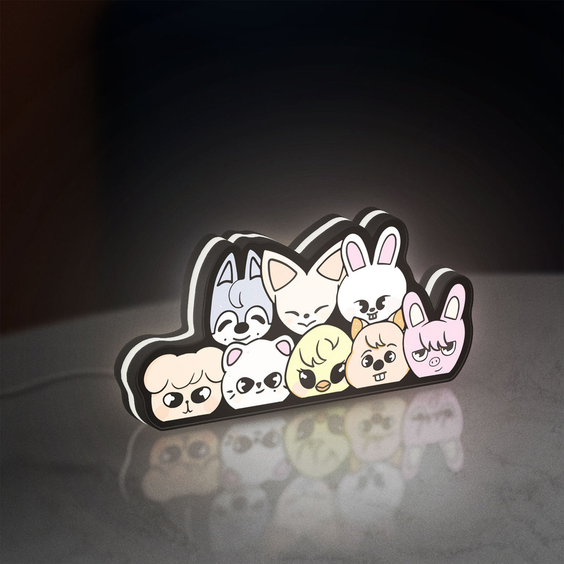 Stray Kids SKZOO K-Pop Mascot LED lightbox hanging on a wall with white glow