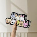 Unlit Stray Kids SKZOO K-Pop Mascot LED lightbox held by hand to show size and details
