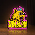 Front view of This is an Outrage Meme Funny Quote LED lightbox sign glowing on a wooden desk