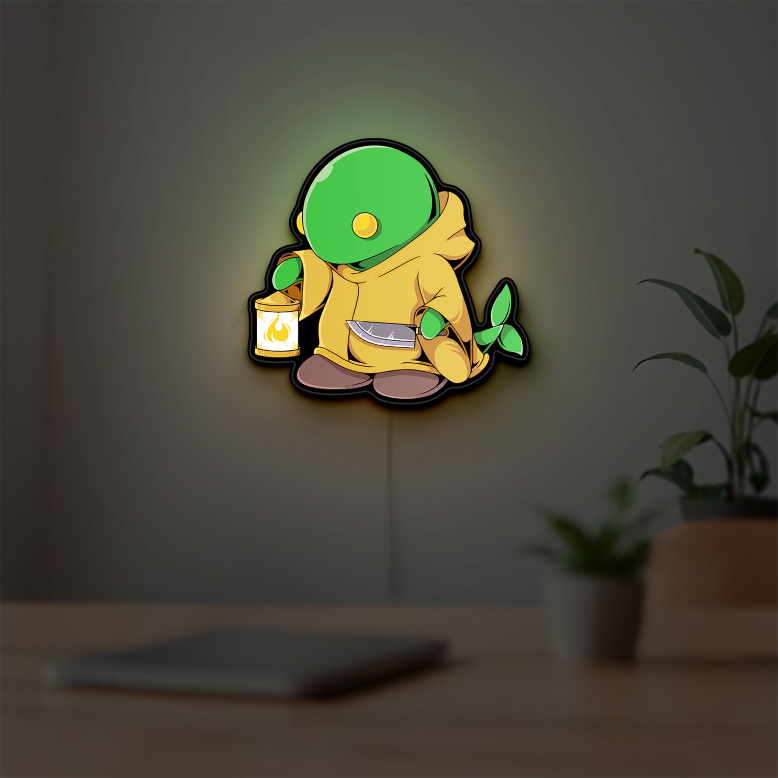 Final Fantasy Tonberry RPG Monster LED lightbox hanging on a room wall with soft green light