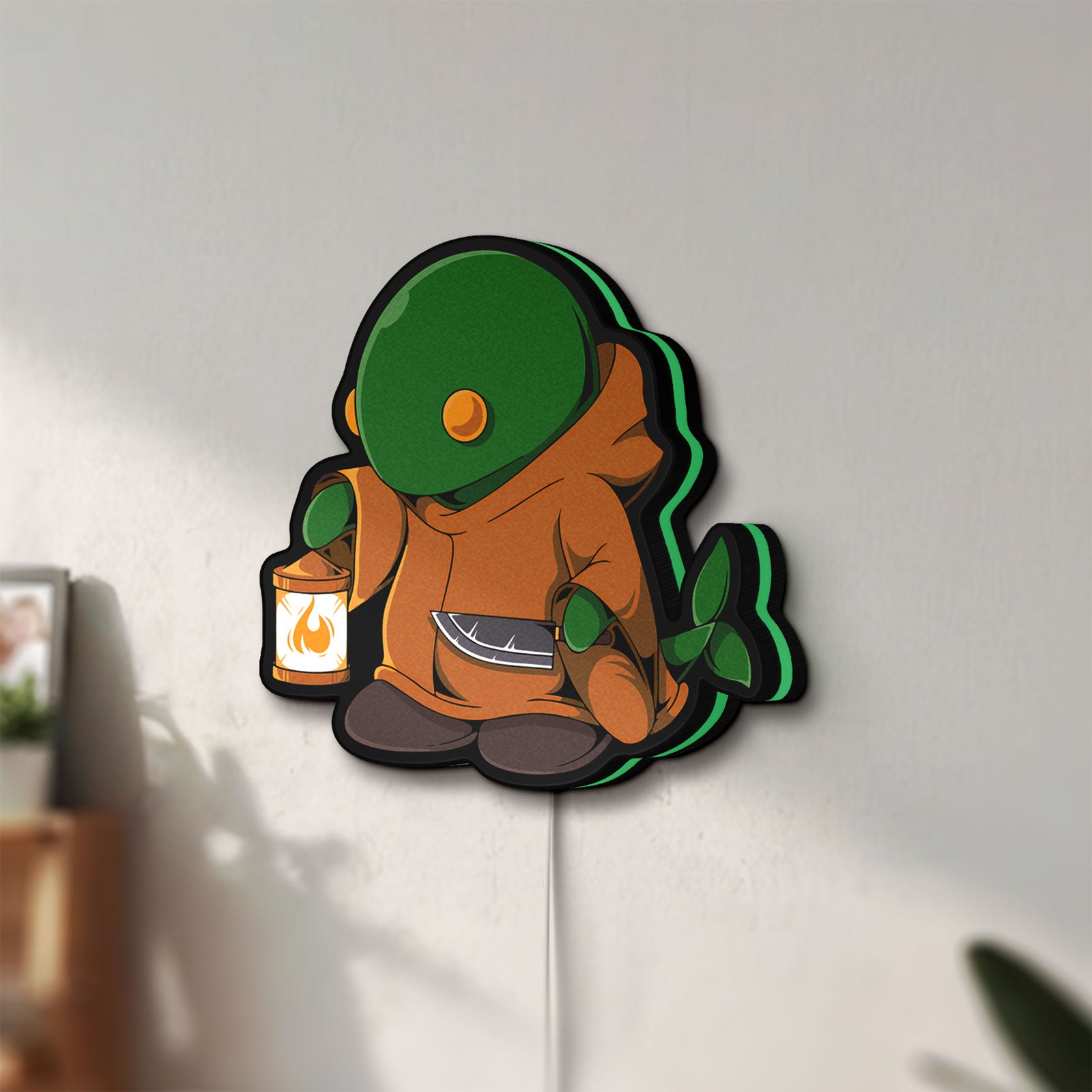 Unlit Final Fantasy Tonberry RPG Monster LED lightbox mounted on a wall in daylight