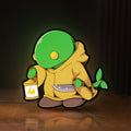 Front view of Final Fantasy Tonberry RPG Monster LED lightbox sign glowing on a wooden desk