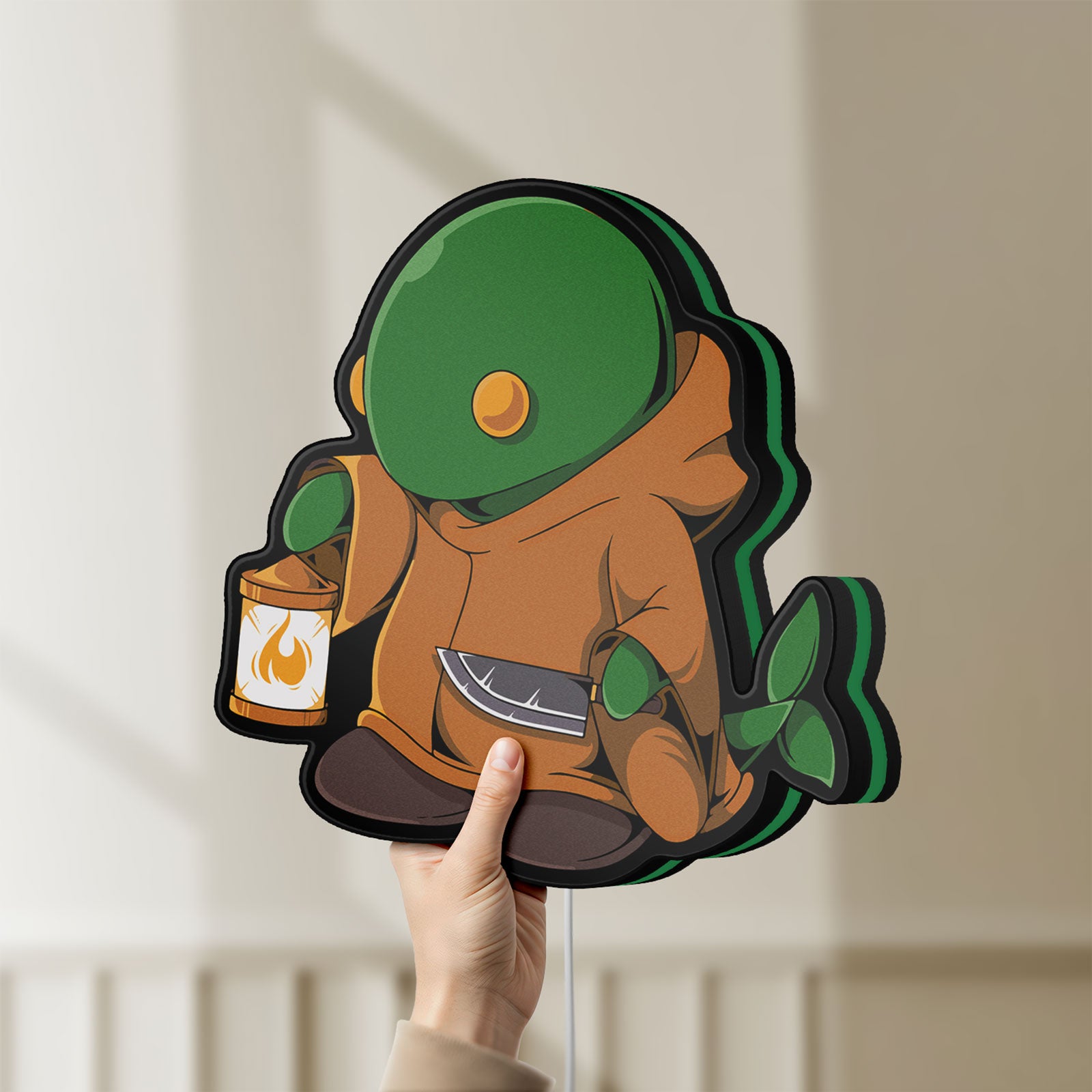 Unlit Final Fantasy Tonberry RPG Monster LED lightbox held by hand to show size and details