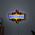 WWE WrestleMania Pro Wrestling LED lightbox hanging on a wall with yellow glow