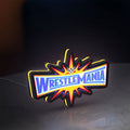 WWE WrestleMania Pro Wrestling LED lightbox standing on a desk from an angled side view with yellow glow