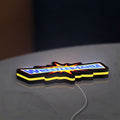 WWE WrestleMania Pro Wrestling LED lightbox lying flat on a desk with yellow glow