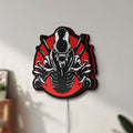 Unlit Alien Xenomorph Sci-Fi Horror Movie LED lightbox mounted on a wall in daylight