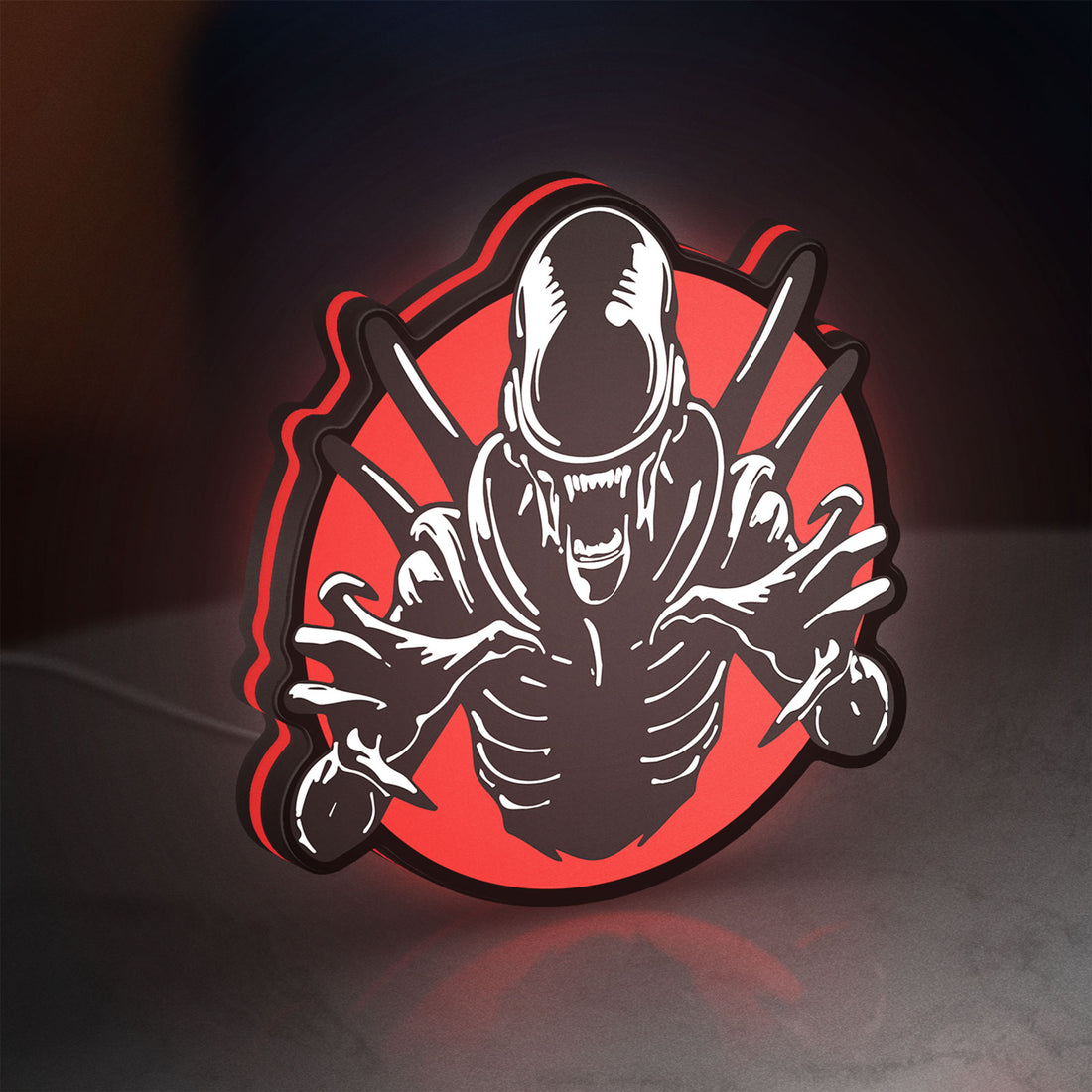 Alien Xenomorph Sci-Fi Horror Movie LED lightbox hanging on a wall with red glow