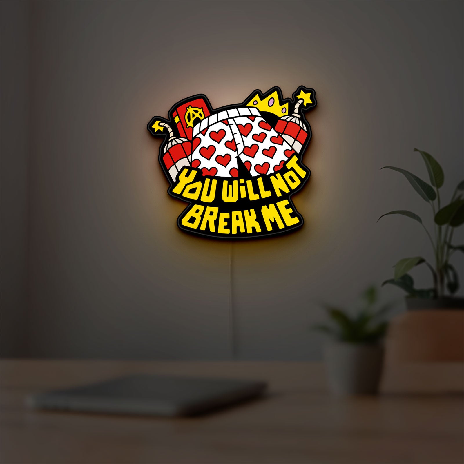You Will Not Break Me Quote LED lightbox hanging on a room wall with soft yellow light