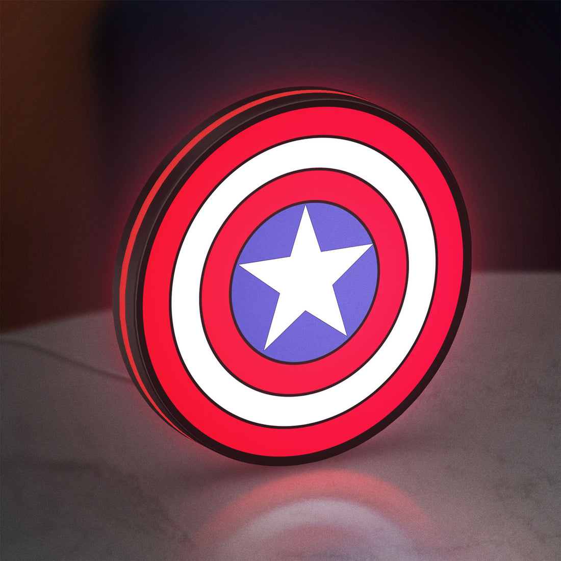 Captain America LED lightbox hanging on a wall with red glow