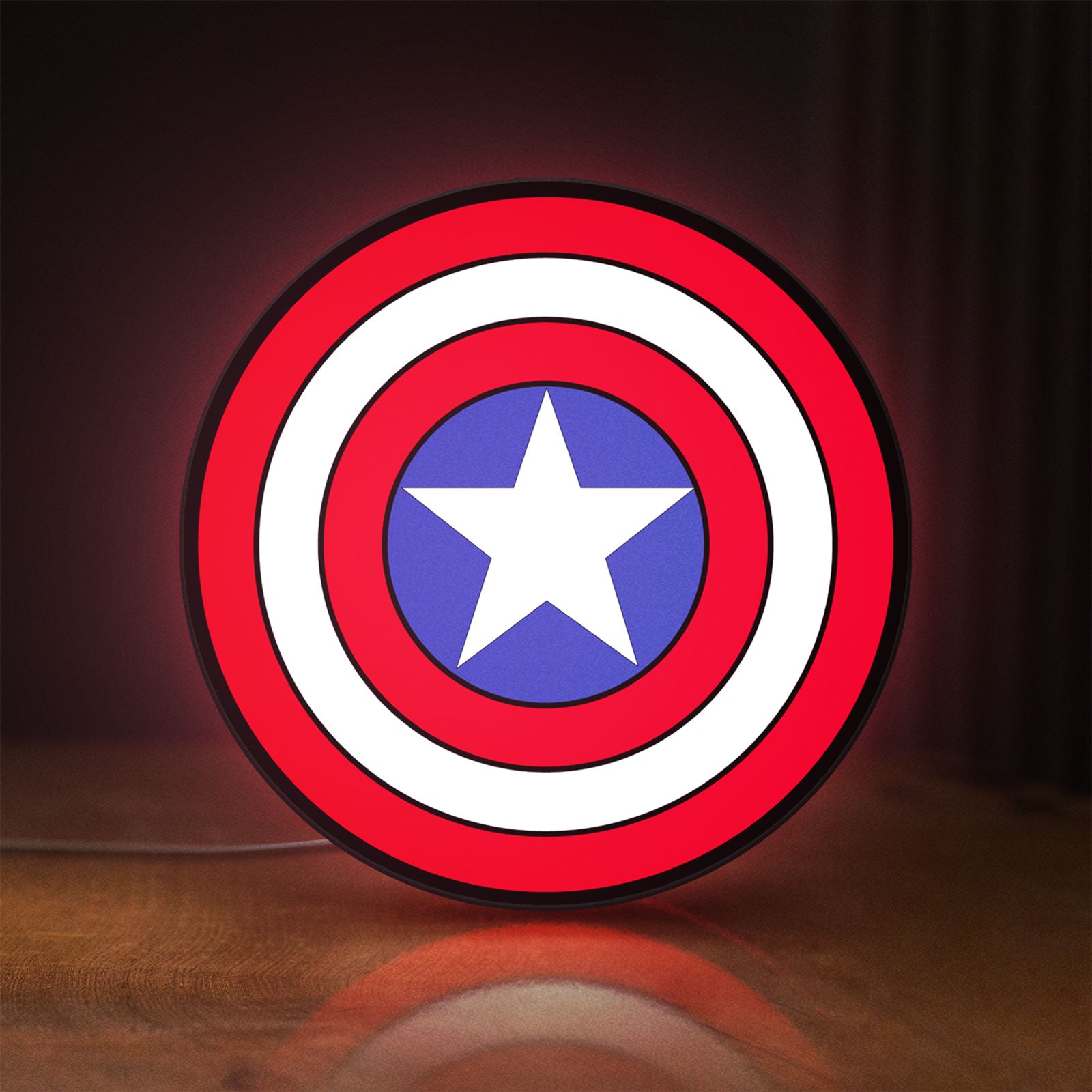 Front view of Captain America LED lightbox sign glowing on a wooden desk