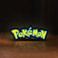 Front view of Pokemon LED lightbox sign glowing on a wooden desk