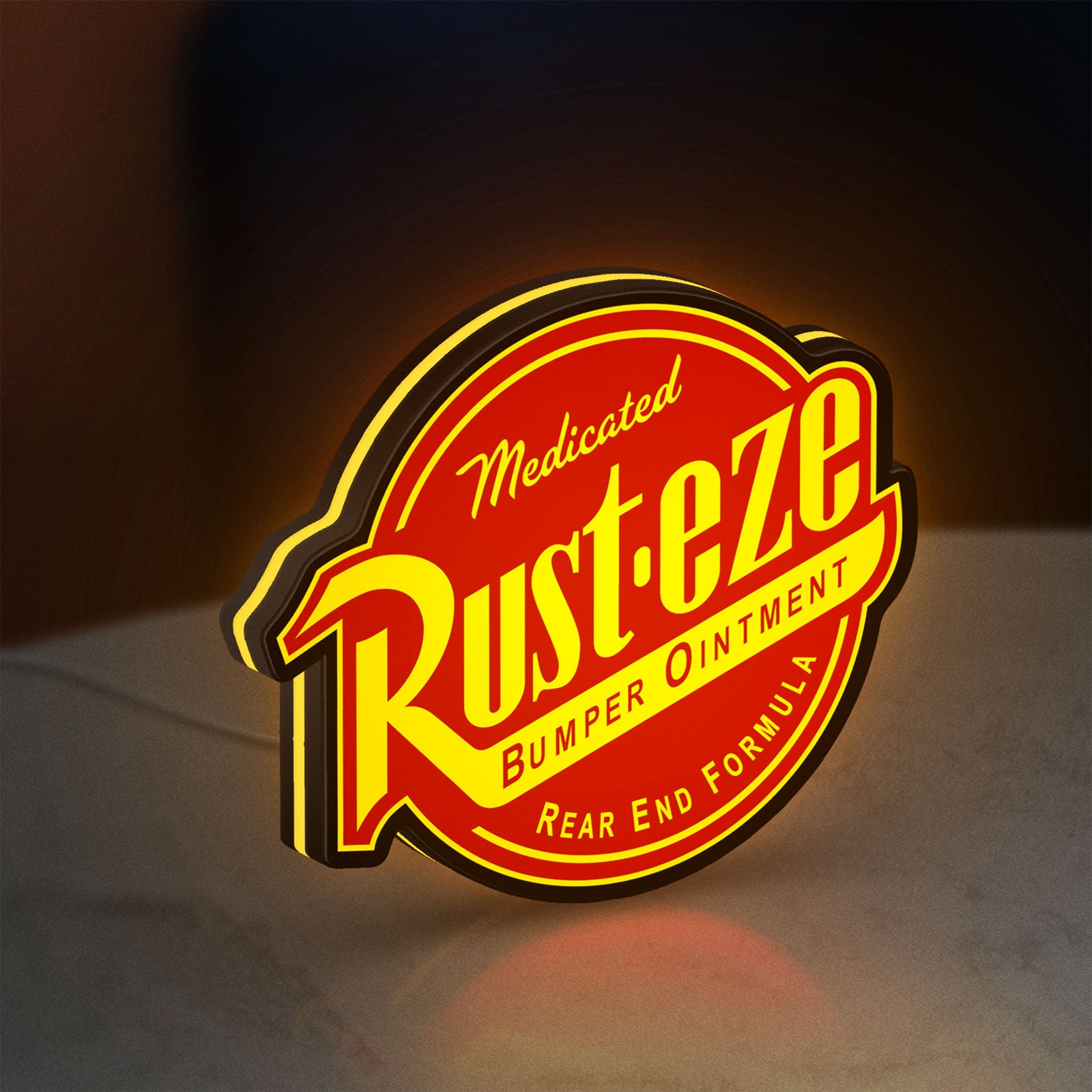 Rusteze LED lightbox standing on a desk from an angled side view with yellow glow