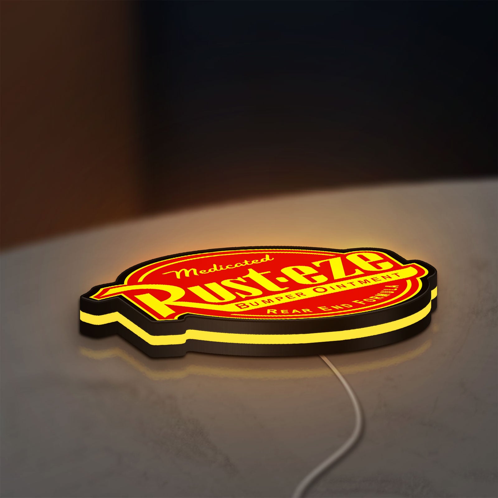 Rusteze LED lightbox lying flat on a desk with yellow glow