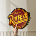 Unlit Rusteze LED lightbox held by hand to show size and details