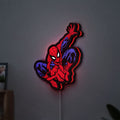 Spider-Man LED lightbox hanging on a wall with red glow