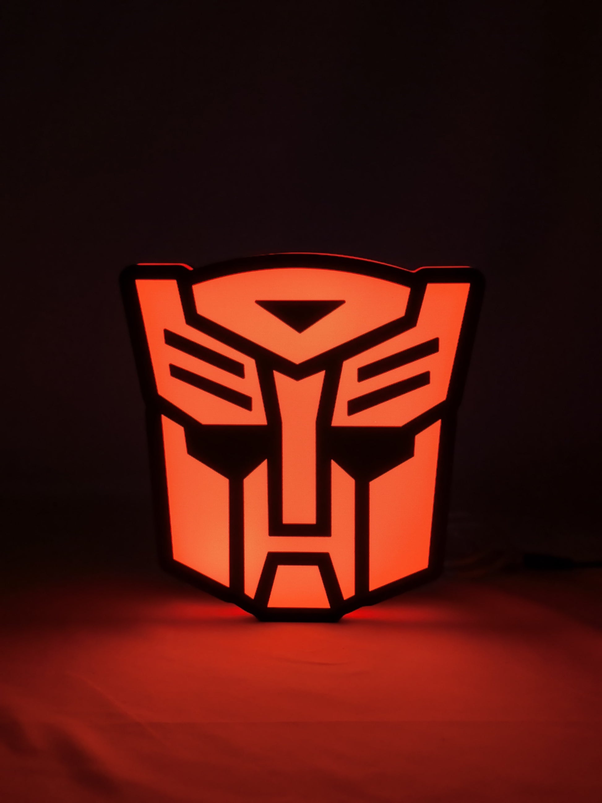 20cm Autobot Glowing Wall Art - Illuminated front view standing, perfect for garage and man cave decor