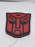 Unlit flat lay angled details of Autobot Illuminated Sign in 20cm, perfect for garage and man cave decor