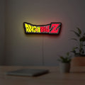 Dragon Ball Z LED lightbox hanging on a room wall with soft yellow light
