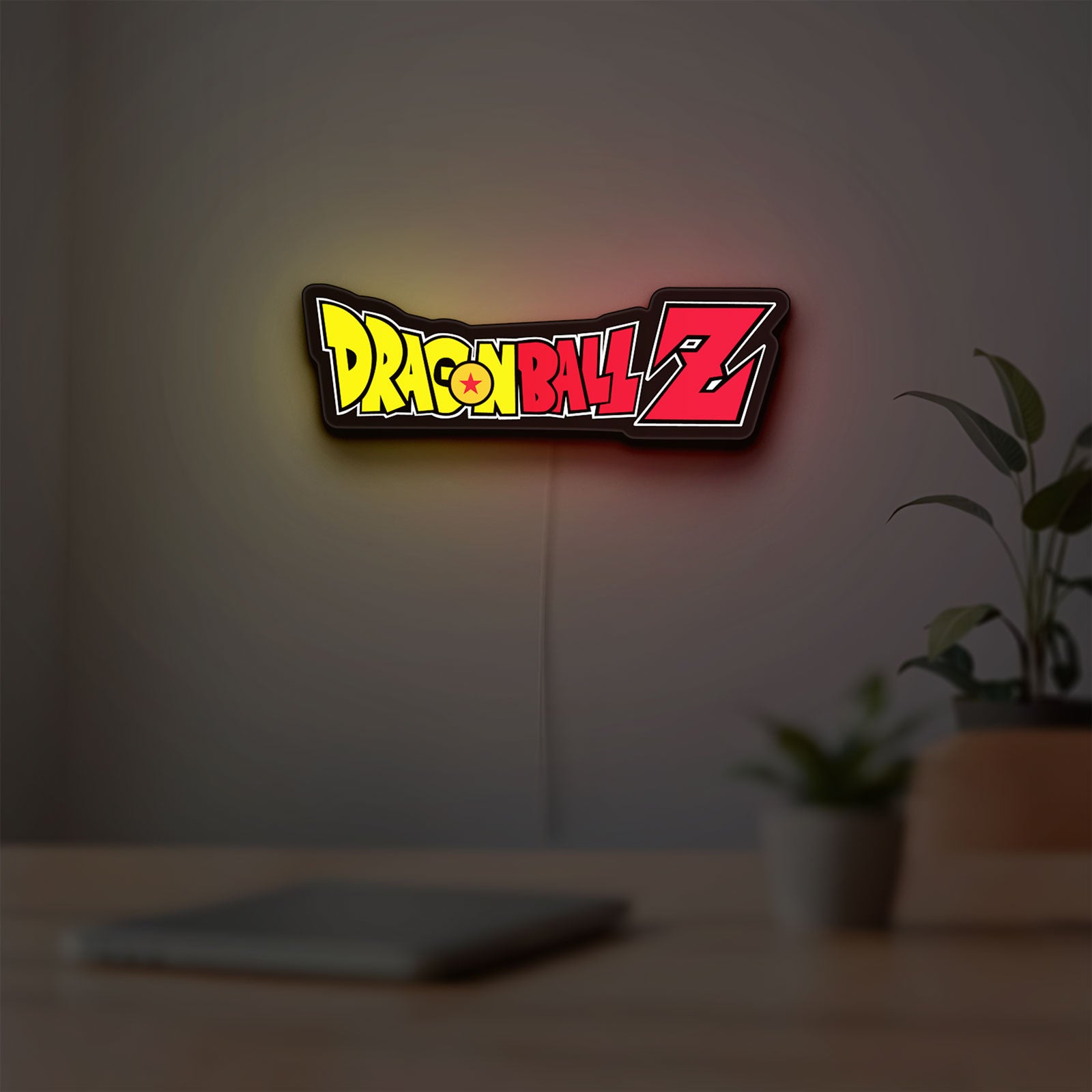Dragon Ball Z LED lightbox hanging on a room wall with soft yellow light