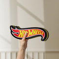 Unlit Hot Wheels Sign LED lightbox held by hand to show size and details