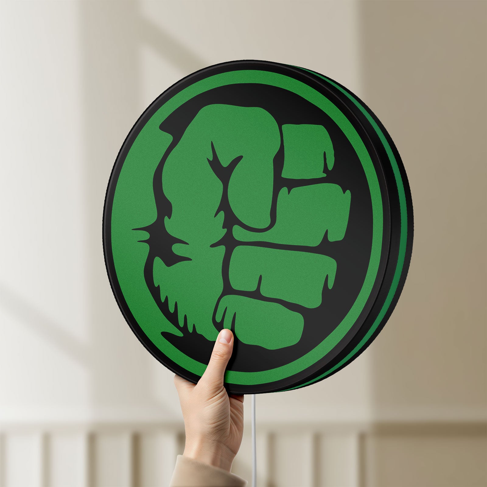 Unlit Hulk Fist LED lightbox held by hand to show size and details