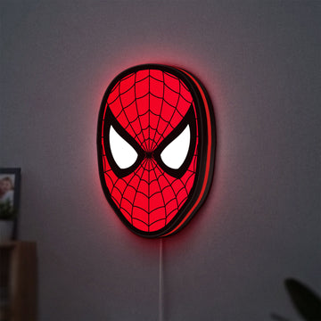 Spider-Man LED lightbox hanging on a wall with red glow